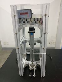 一种自动提升式双轮车摆放装置