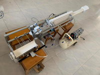 无壳装药榴弹炮及其气动弹射装弹装置