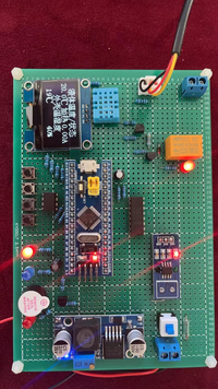 基于单片机智能化婴儿奶粉冲调水温监测系统设计